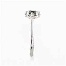 Anello in argento con moldavite e granati 3125