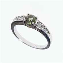 Anello in argento con moldavite e zirconi 3038