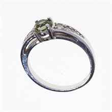 Anello in argento con moldavite e zirconi 3038