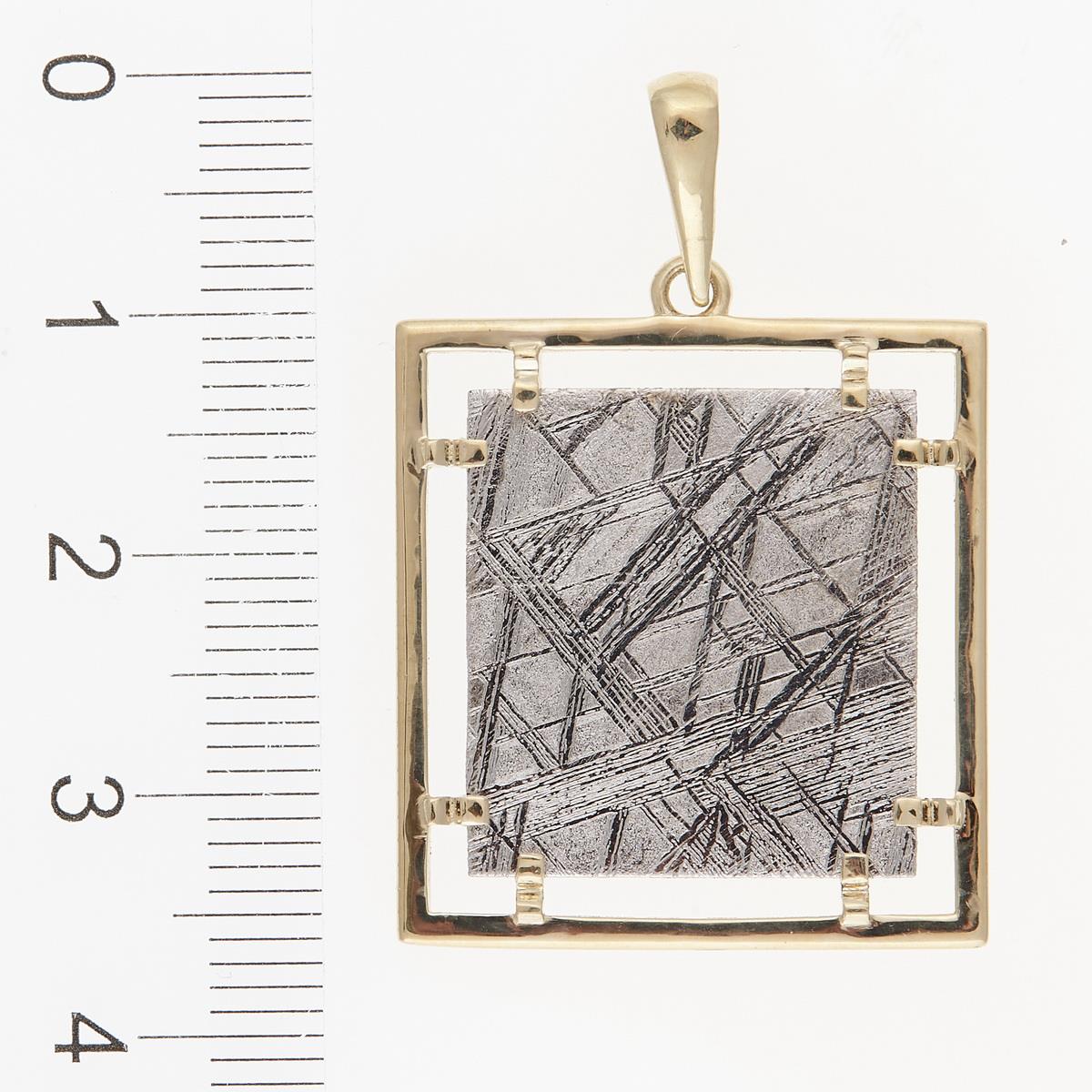 Golden pendant with meteorite 003