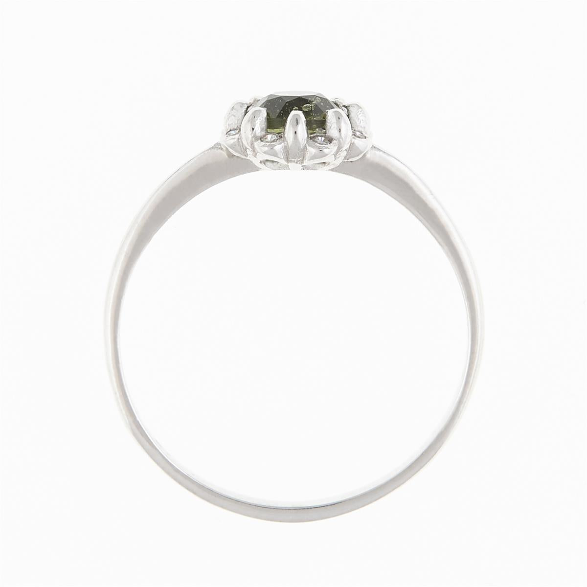 Gold ring with moldavite and diamonds AUVD3125WG