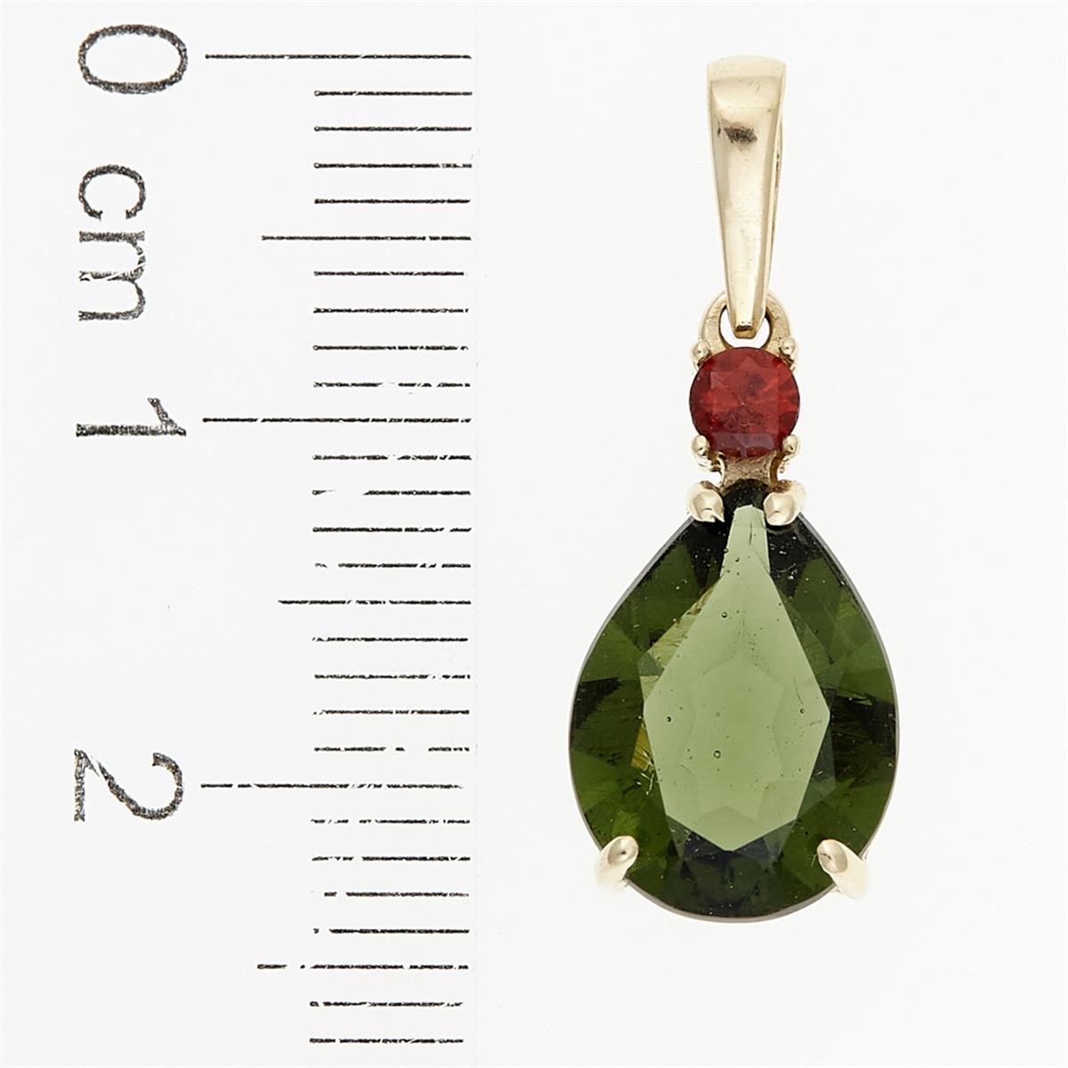 Golden pendant with moldavite and garnets 1334
