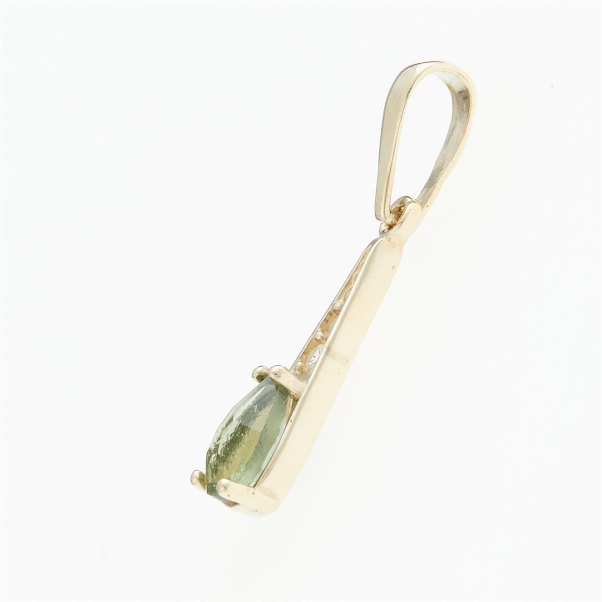 Golden pendant with moldavite and zirconia 1002