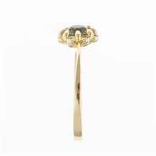 Anello in oro con moldavite e zirconi 3125
