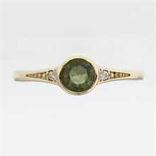 Anello in oro con moldavite e zirconi 3144
