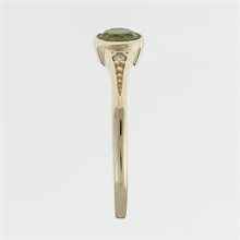 Anello in oro con moldavite e zirconi 3144