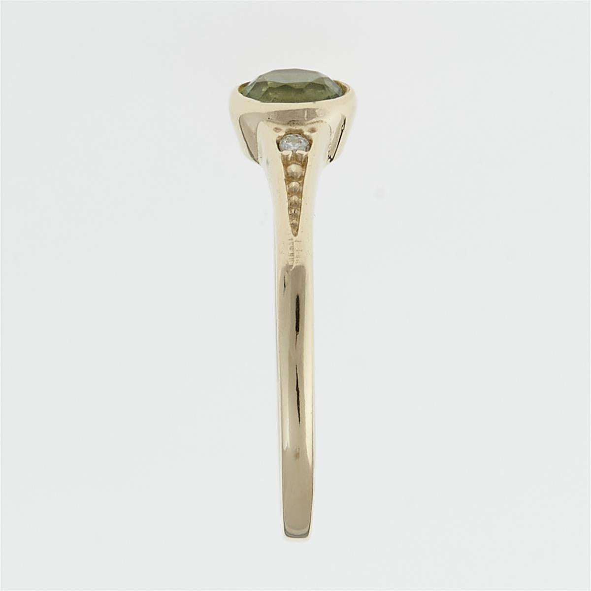 Golden ring with moldavite and zirconia 3144
