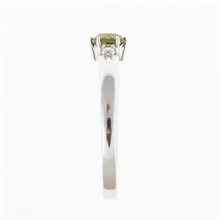 Anello in oro con moldavite e zirconi 3220