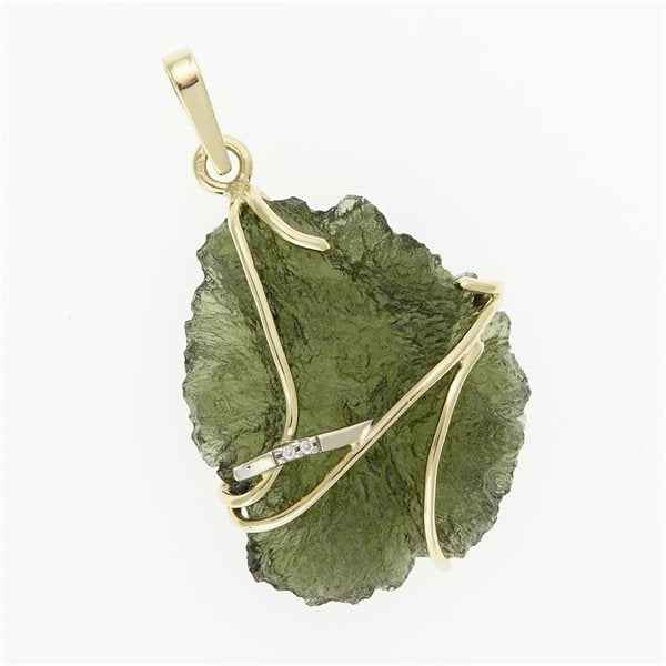 Golden pendant with a moldavite and zirconia 5664