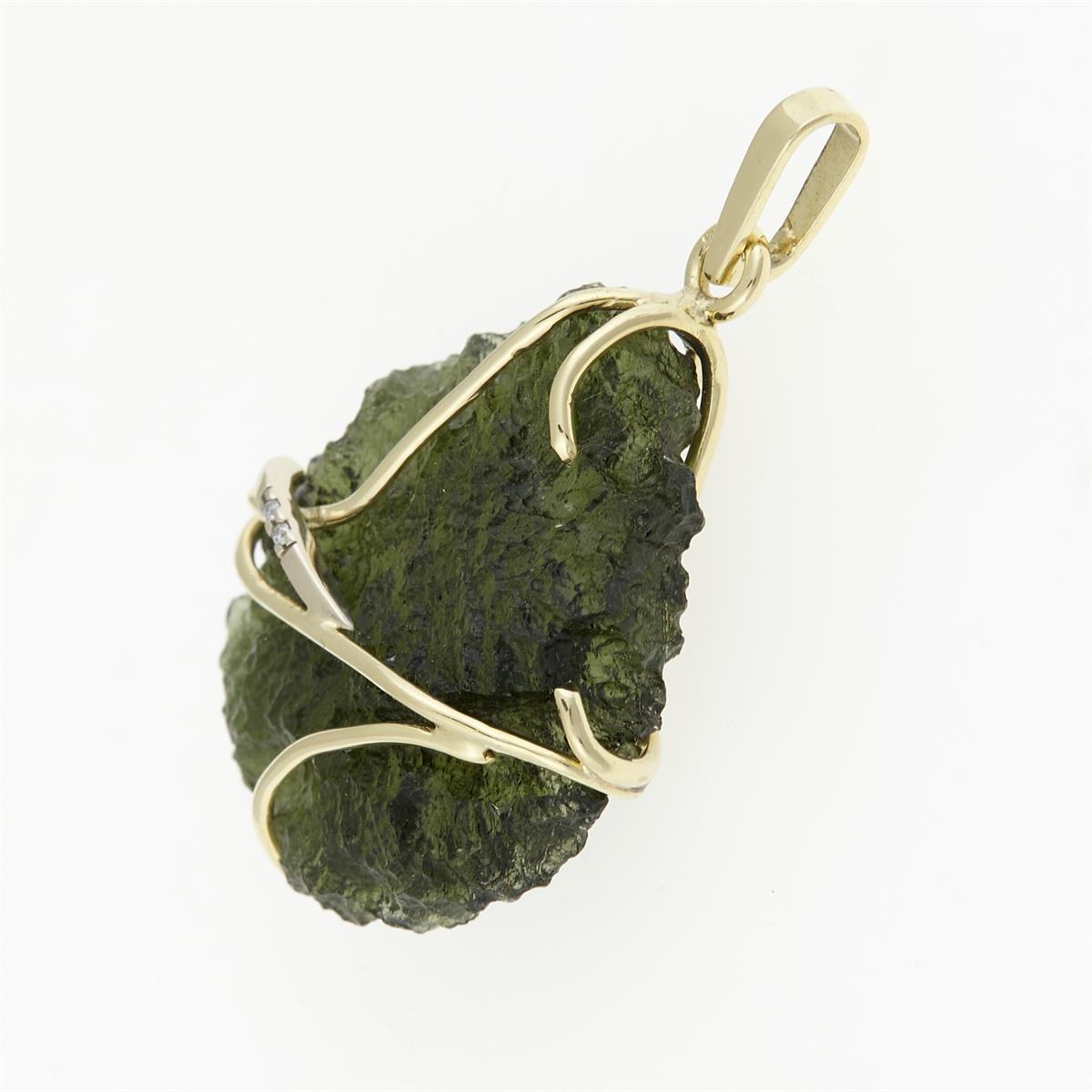 Golden pendant with a moldavite and zirconia 5664
