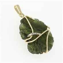 Golden pendant with a moldavite and zirconia 5664