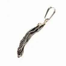 Pendant with meteorite 064