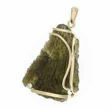 Golden pendant with a moldavite and zirconia 9489
