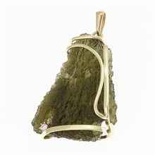 Golden pendant with a moldavite and zirconia 9489
