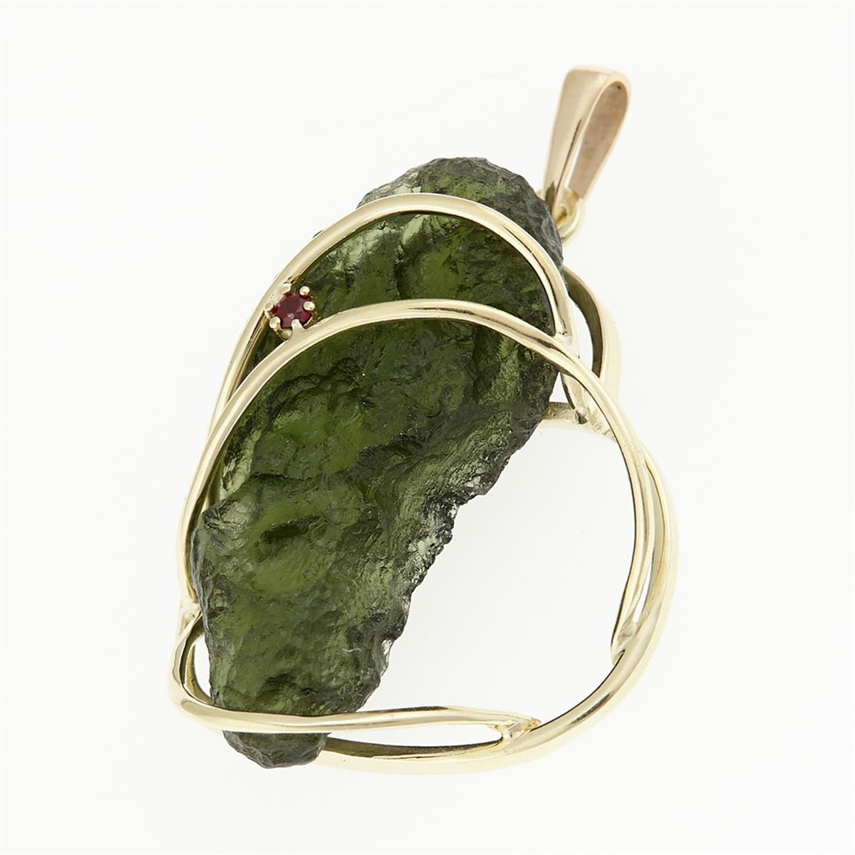 Golden pendant with a moldavite and garnet 9508