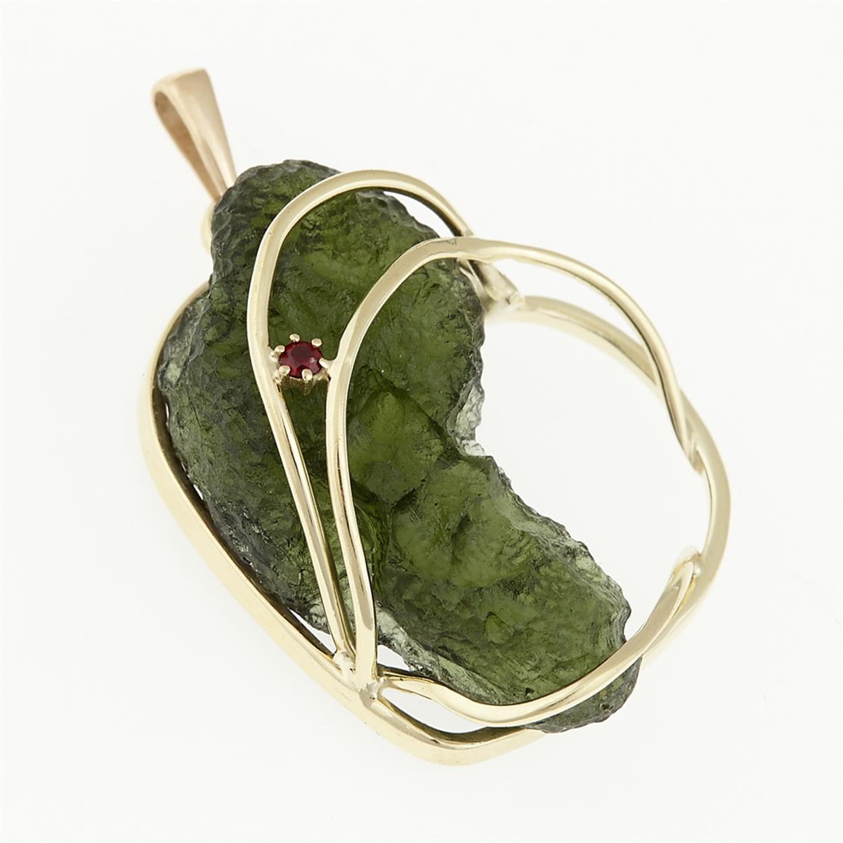 Golden pendant with a moldavite and garnet 9508