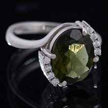 Anello in argento con moldavite e zirconi 092