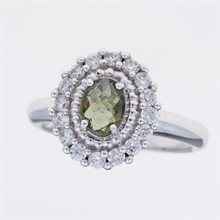 Anello in argento con moldavite e zirconi 157