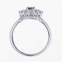 Anello in argento con moldavite e zirconi 157