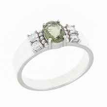 Anello in argento con moldavite e zirconi 160
