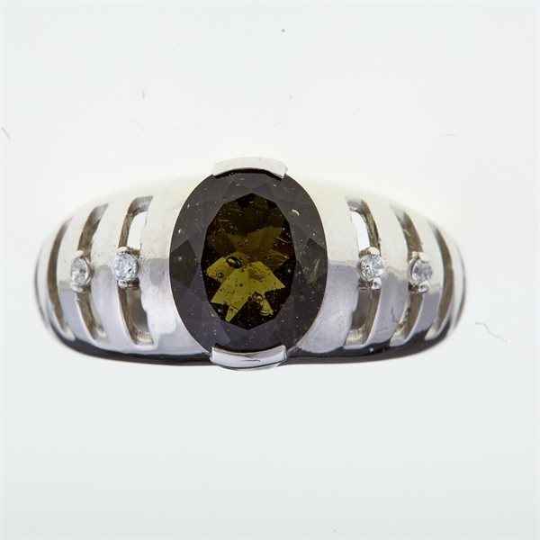 Anello in argento con moldavite e zirconi 202