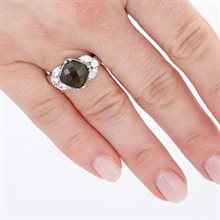 Anello in argento con moldavite e zirconi 252