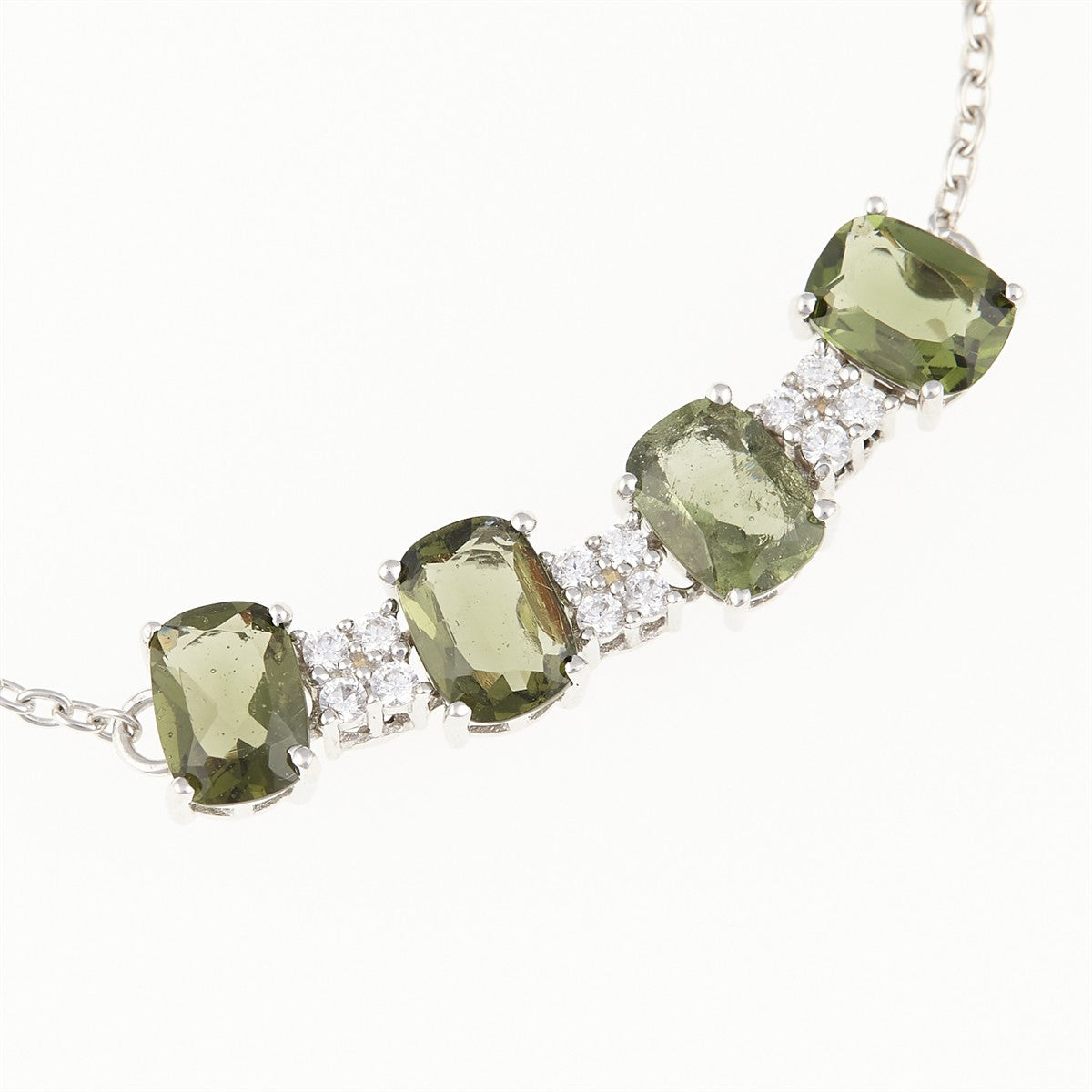 Silver bracelet with moldavites and zircons BR02