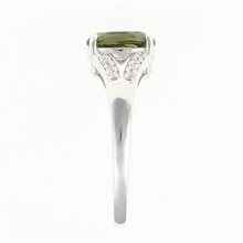 Anello in argento con moldavite e zirconi 04